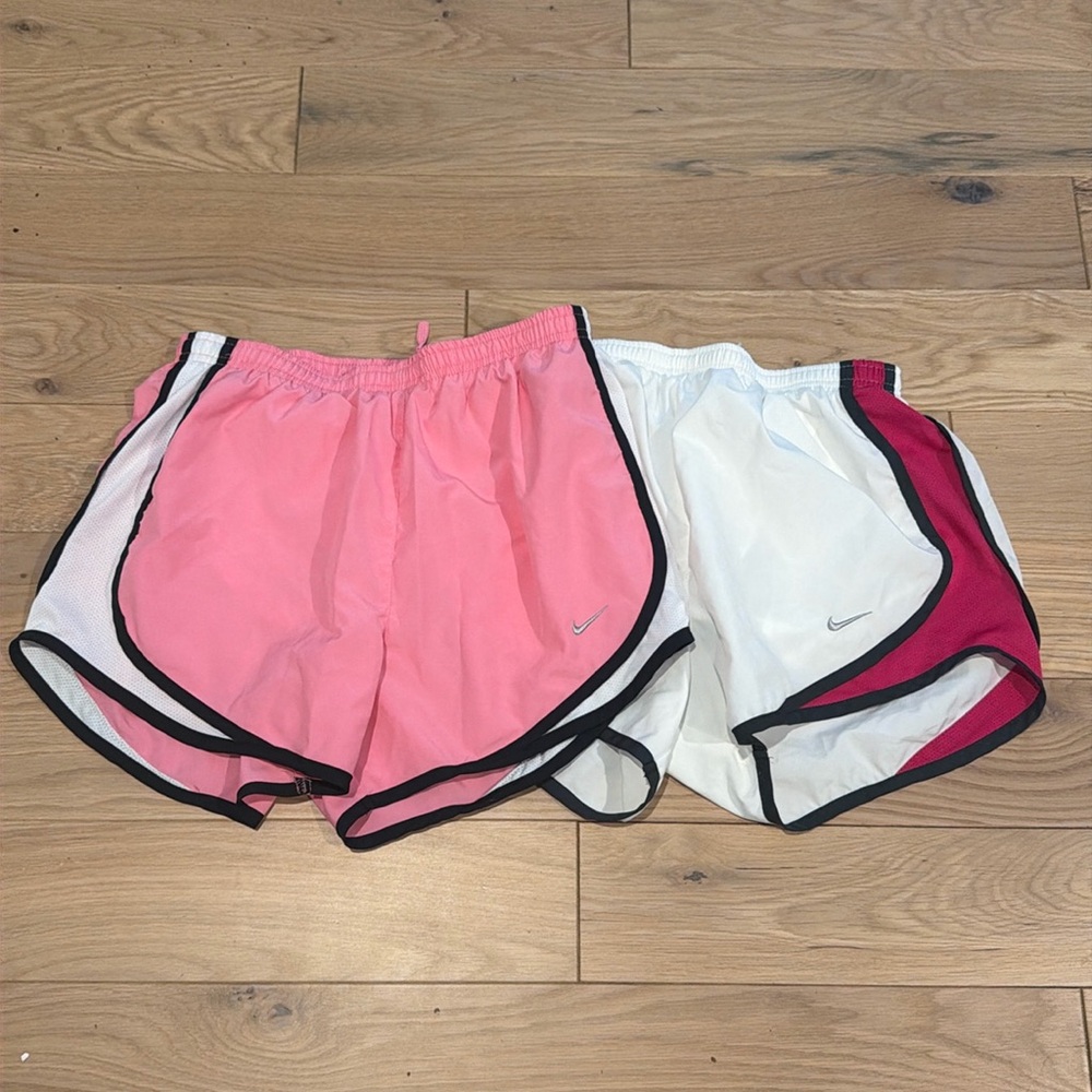 Nike dri fit running shorts, two pairs, white and pink, both size small
